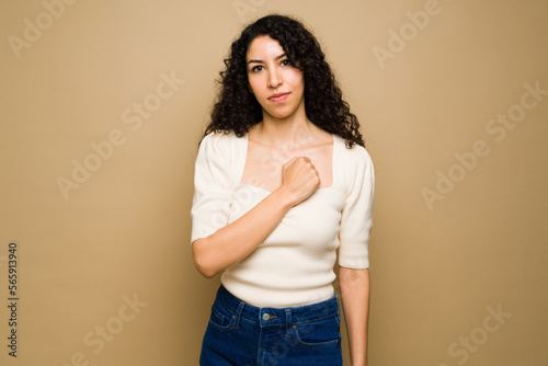 Latin woman saying sorry using sign language photo