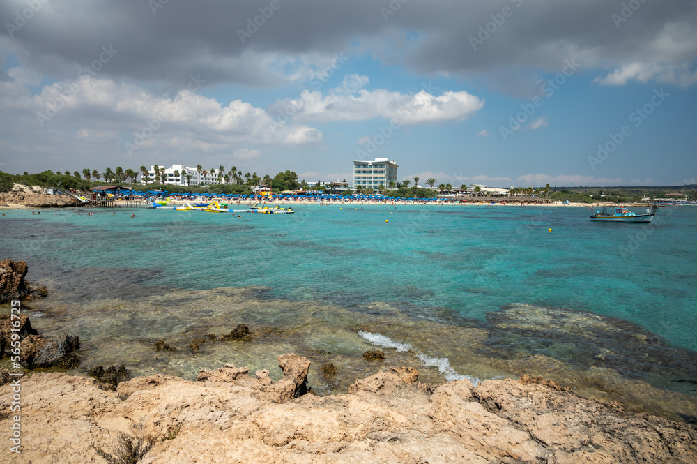 View on seashore with blue crystal clear water on Mediterranean sea near Nissi Beach, Ayia Napa, Cyprus