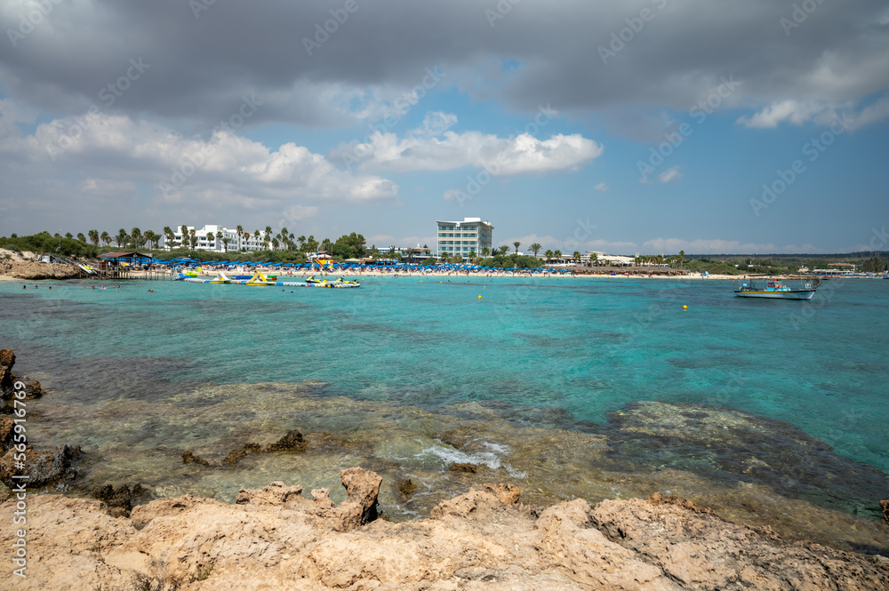 View on seashore with blue crystal clear water on Mediterranean sea near Nissi Beach, Ayia Napa, Cyprus