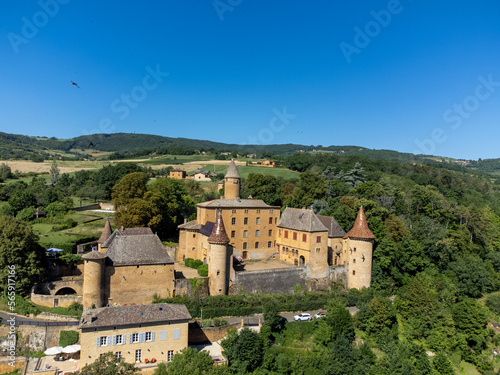 Wine making region Beaujolais Pierre dorees wioth yellow houses and hilly vineyards, aerial view, France