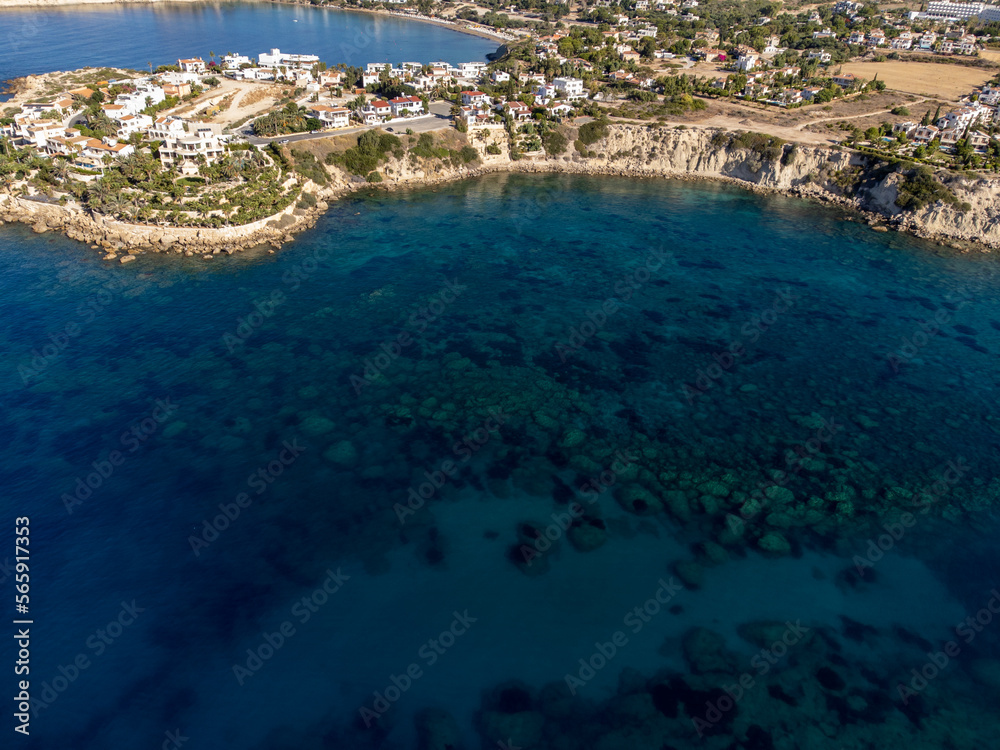 Aerial view on clear blue water of Coral bay in Peyia, Mediterranean sea near Paphos, Cyprus, Coral beach
