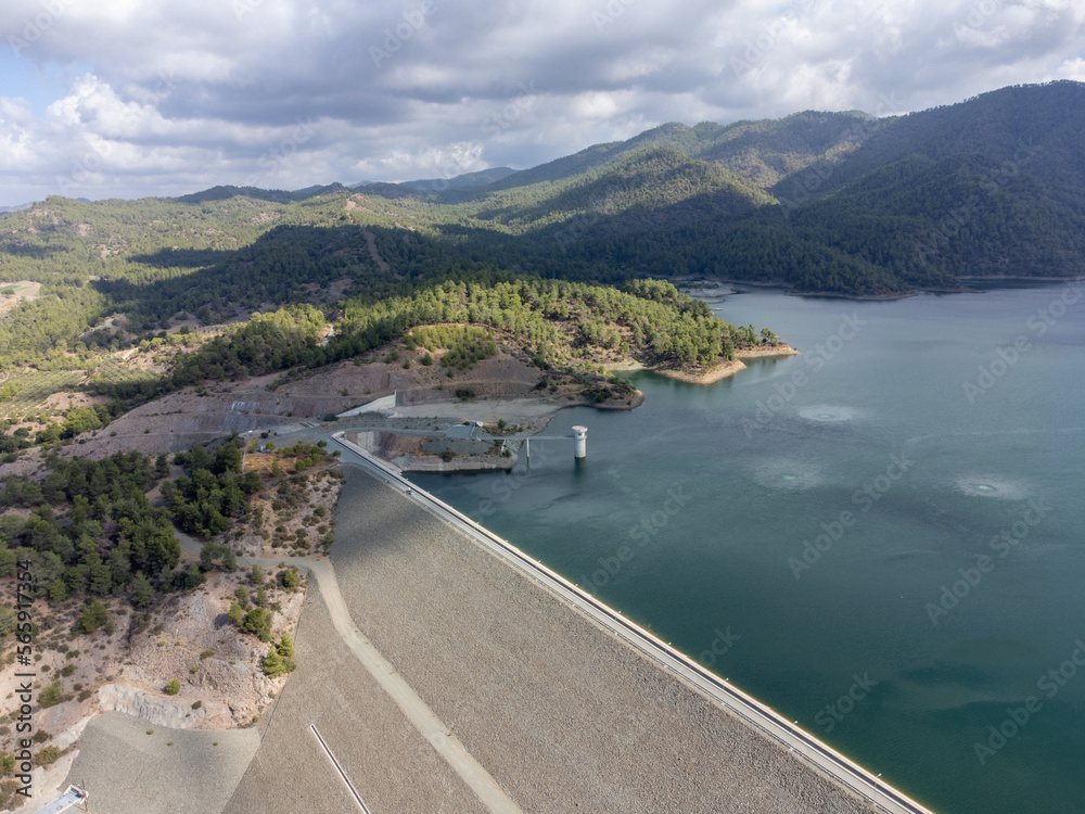 Aerial view on freshwater lake with dam for irrigation and drinking in centre of dry, sunny Cyprus island Aerial view on freshwater lake with dam for irrigation and drinking in centre of dry, sunny Cyprus island