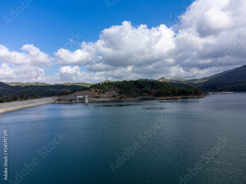 Aerial view on freshwater lake with dam for irrigation and drinking in centre of dry, sunny Cyprus island © barmalini