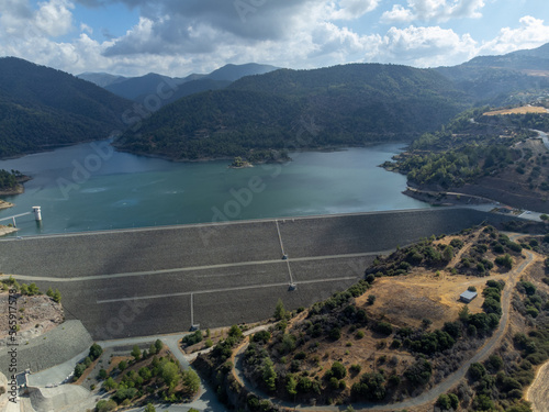 Aerial view on freshwater lake with dam for irrigation and drinking in centre of dry, sunny Cyprus island photo