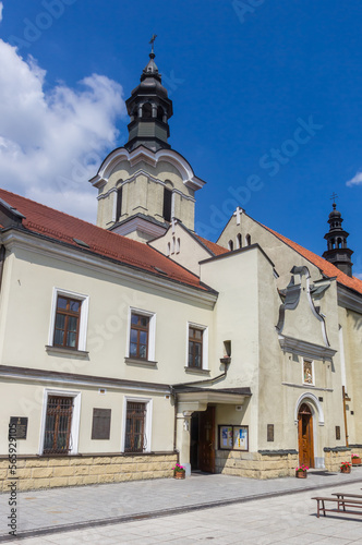 Tower of the historic jesuit monastery in Nowy Sacz, Poland © venemama