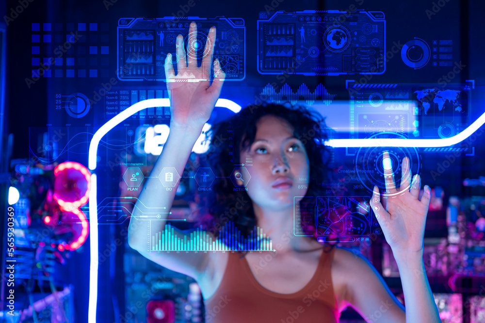 An Asian woman is touching interface on virtual reality screen , Technology futuristic concept . An Asian woman is touching interface on virtual reality screen , Technology futuristic concept .