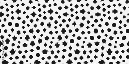 Black stars are spiked, scattered on a white background. Vector for print and design of seamless decors.