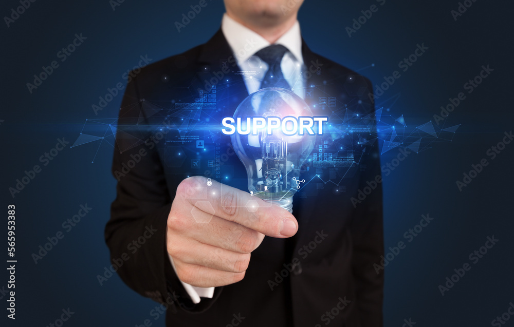 Businessman holding a light bulb Businessman holding a light bulb