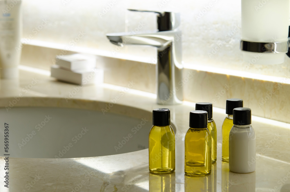 Containers with shampoo and hair conditioner. Means for washing hair and body. Hygienic cosmetic liquid hair wash. Bottles of shampoo and lotions. Containers with shampoo and hair conditioner. Means for washing hair and body. Hygienic cosmetic liquid hair wash. Bottles of shampoo and lotions.