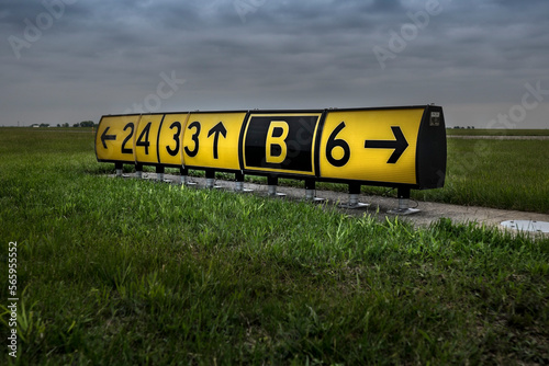 Airport taxi and runway sign