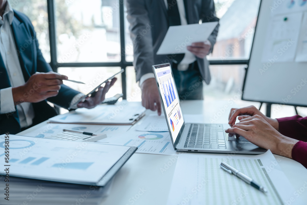 Team of businesspeople working with chart of accounts (COA) and balance sheet, stock market data, consulting asset accounts record any resources of company, anti bribery, error checking concept Team of businesspeople working with chart of accounts (COA) and balance sheet, stock market data, consulting asset accounts record any resources of company, anti bribery, error checking concept