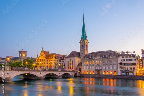 Scenic panoramic view of historic Zürich city center with famous Fraumünster and Grossmünster Church and river Limmat at Lake Zurich on a beautiful sunny day with blue sky in summer, Switzerland © Mislav