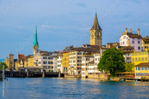 Scenic panoramic view of historic Zürich city center with famous Fraumünster and Grossmünster Church and river Limmat at Lake Zurich on a beautiful sunny day with blue sky in summer, Switzerland