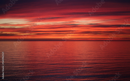 Photo of a bright red sunset on the Black Sea