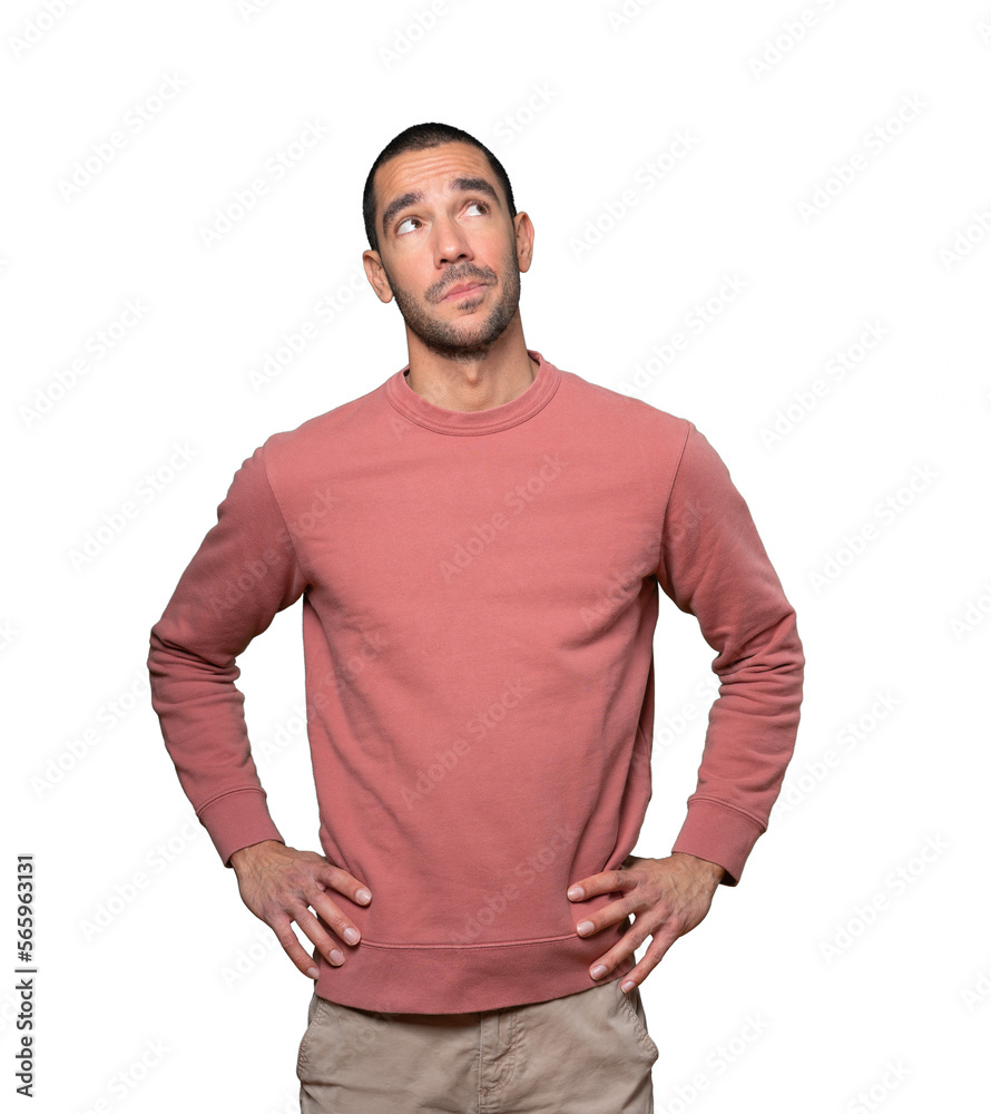 Serious young man looking against background Serious young man looking against background