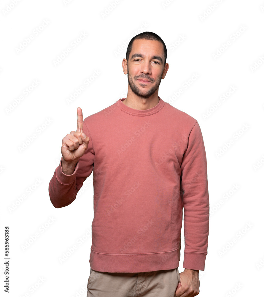 Young man making a number one gesture Young man making a number one gesture