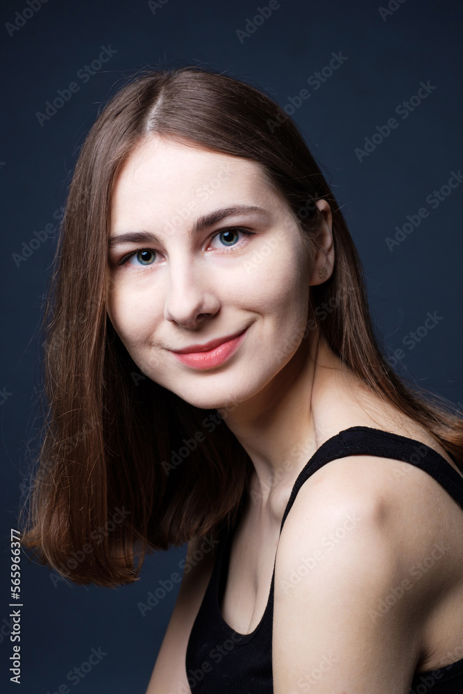 portrait of young confident happy woman in studio portrait of young confident happy woman in studio