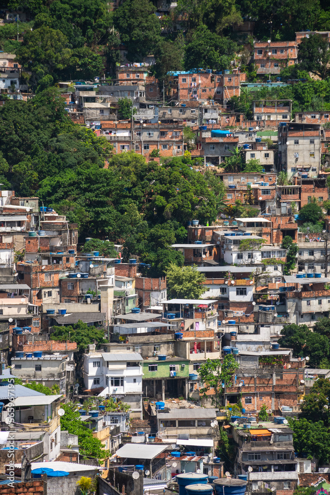 Beautiful view to poor favela houses on hill side