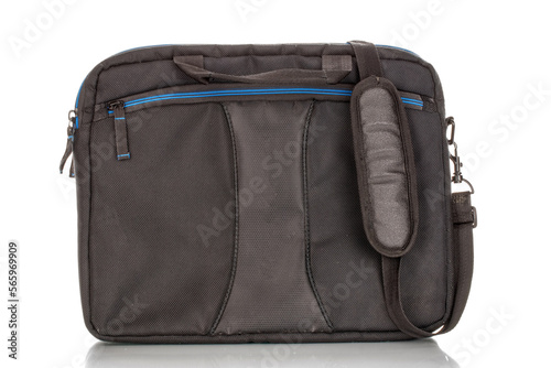 One black laptop carrying bag made of waterproof material macro isolated on white background.