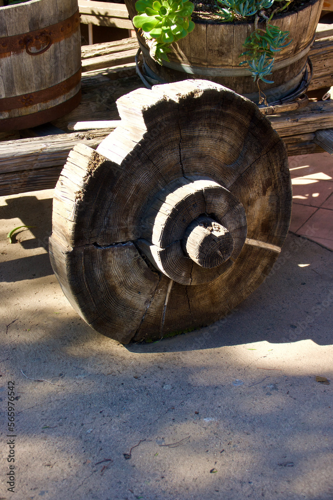 side view of damaged wooden cart wheel side view of damaged wooden cart wheel