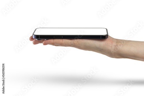 Phone in hand isolate on PNG transparent background. A modern smartphone lies on the palm with the screen up, side view, mockup for insertion into the project. photo