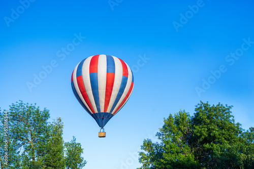 hot air balloon of different colors on the background of the sky