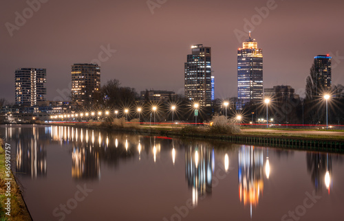 Cityscape of Amsterdam in the evening  view of skyscrapers at Omval neighbourhood and Weespertrekvaart canal