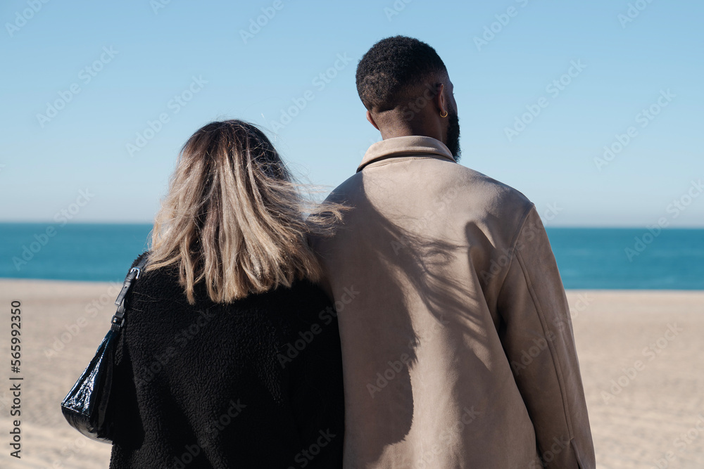 couple in front of the beach