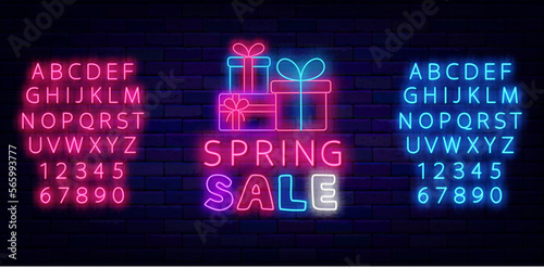 Spring sale neon signboard. Presents stack. Season special offer. Shopping advertising. Vector stock illustration
