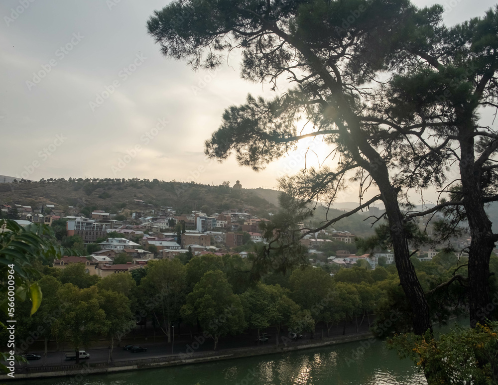 Fototapeta premium Sunset in Tbilisi, view from the hill