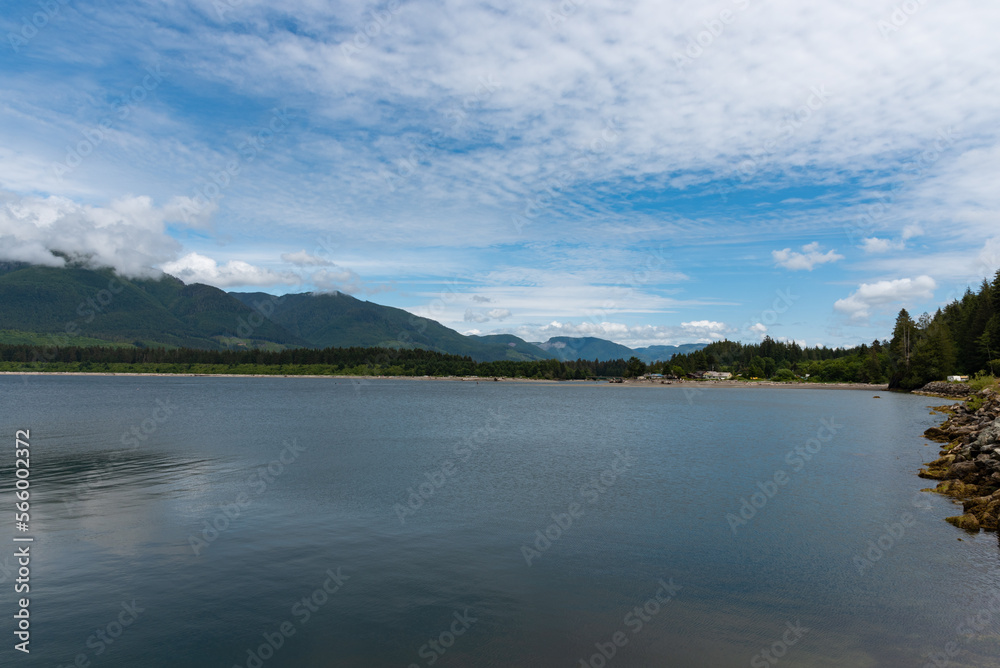 Calm mountain lake surrounded by forest