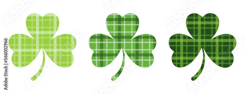 Clip art set of Irish clover leaves in plaid textures in in green colours and Isolated background. Hand drawn design for St. Patrick’s day celebration, party decoration, scrapbooking, home decor.