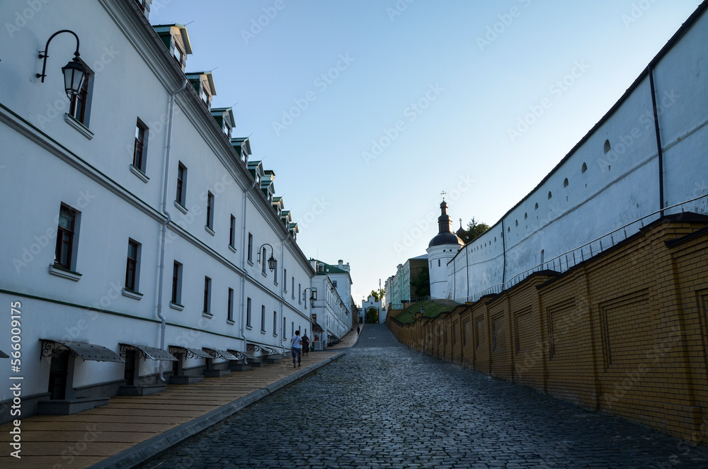 Cobbled street with residential buildings and church shops on the territory of the Kyiv Pechersk Lavra (Kyiv Monastery of the Caves), Ukraine 