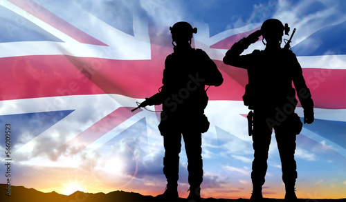 Silhouettes of a soldiers with United Kingdom flag on background of sky. Background for Remembrance Day. United Kingdom Armed Forces concept. EPS10 vector