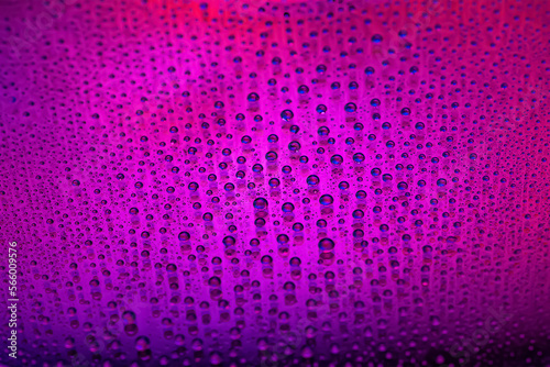 Water drops. Texture of the drops. Abstract gradient background. Purple gradient. Heavily textured image. Shallow depth of field. Selective focus