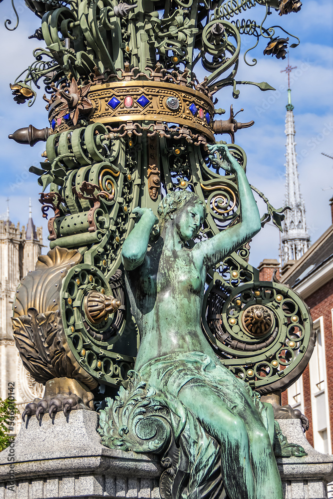 Symbolic sculpture of Amiens - Dewailly Clock (l'horloge Dewailly) near Amiens Cathedral. Dewailly Clock built in 1892. Amiens, Picardy, Somme, France.
