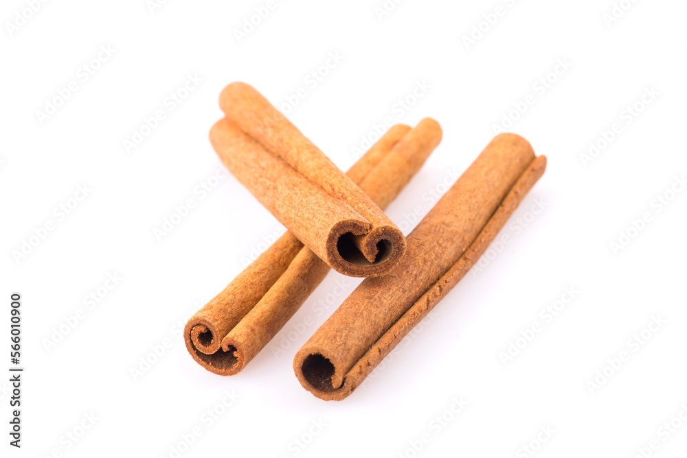 Cinnamon sticks isolated on white background. Top view. Cinnamon sticks isolated on white background. Top view.