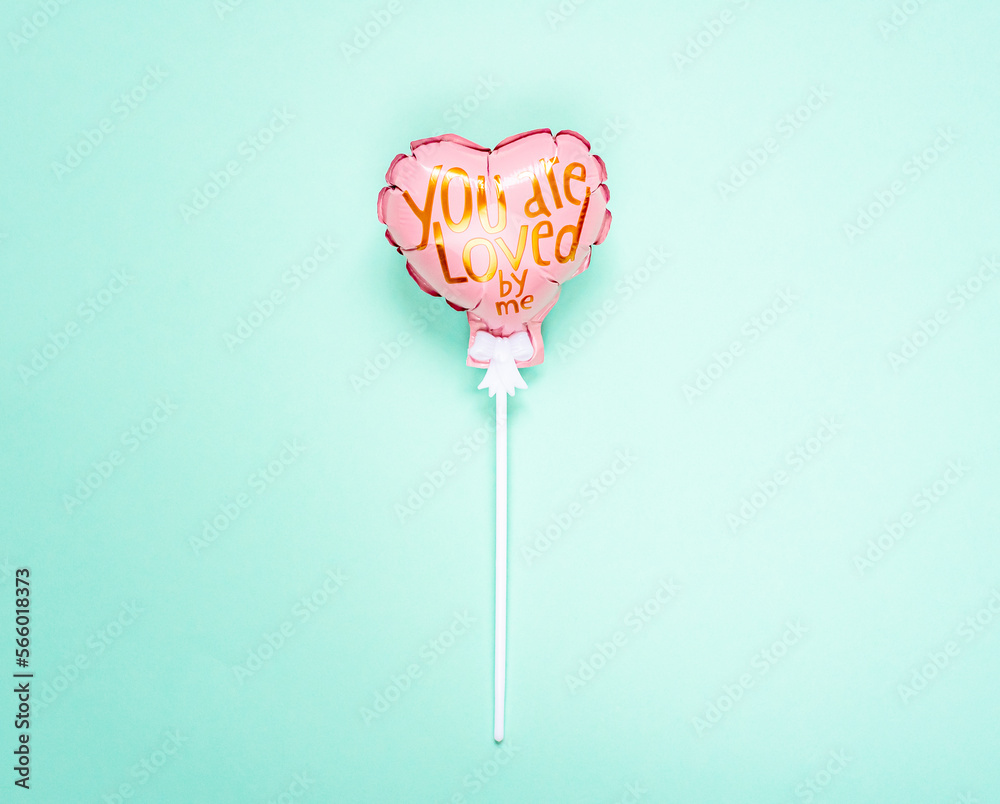 Heart balloon, flat lay, minimalism, copy space for text, Valentine's day, love, blue green background Heart balloon, flat lay, minimalism, copy space for text, Valentine's day, love, blue green background