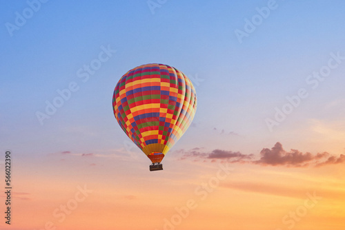 Landscape of fabulous Kapadokya. Colorful flying air balloon in sky at sunrise in Anatolia. Vacations in beautiful destination in Goreme, Turkey