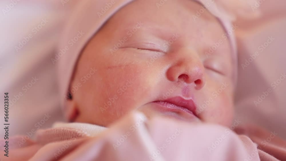 newborn happy baby a girl sleeping. happy family baby dream concept. newborn girl in a hat and suit sleeping in the maternity hospital waiting for lifestyle discharge. cute beautiful baby sleeping newborn happy baby a girl sleeping. happy family baby dream concept. newborn girl in a hat and suit sleeping in the maternity hospital waiting for lifestyle discharge. cute beautiful baby sleeping