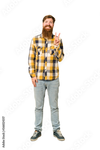 Young adult redhead man with a long beard standing full body isolated showing number two with fingers.