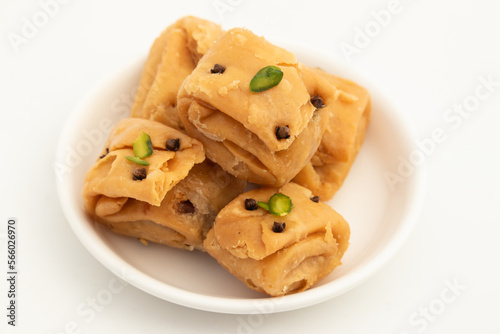 Indian Bengali Mithai Laung Latta Also Called Lavang Lata Long Latika Made Of Cloves Ghee And Stuffed With Mawa Khoya Chasni Mava Khoa Is Enjoyed On Deepawali, Teez, Rakhi Holi, Rakshabandhan And Teej