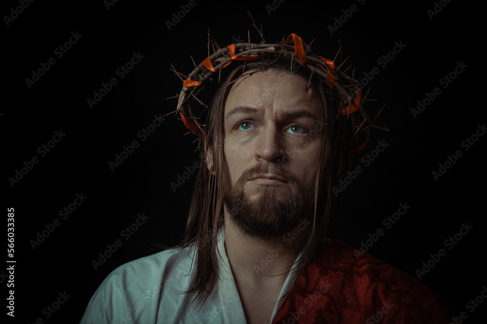 Jesus Christ wearing a crown of thorns and white chiton toga mantle ...