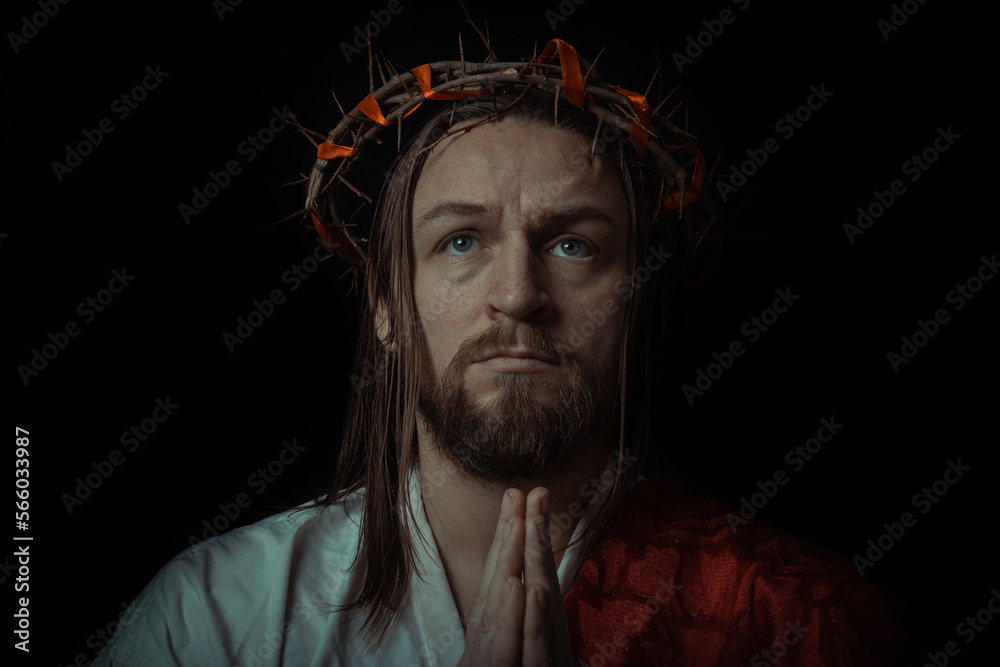 Jesus Christ wearing a crown of thorns and white chiton toga mantle ...