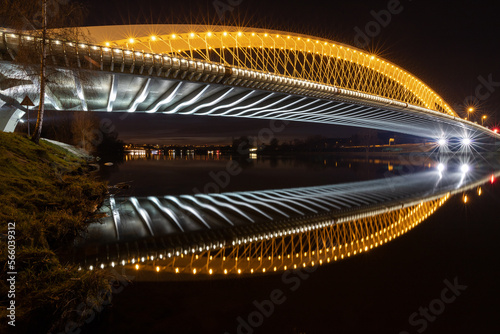 illuminated road and tram bridge over the Vltava in Prague