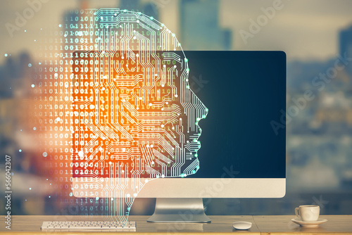 Double exposure of table with computer and brain hologram. Data innovation concept.