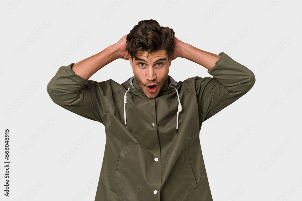 Young handsome caucasian man isolated on white background screaming, very excited, passionate, satisfied with something. Young handsome caucasian man isolated on white background screaming, very excited, passionate, satisfied with something.