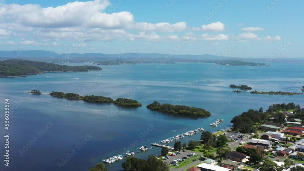 Lake Macquarie waterfront of Swansea town marina with floating yachts 4k.
Lake Macquarie waterfront of Swansea town marina with floating yachts 4k.