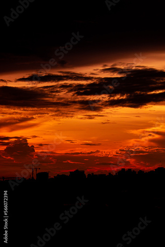 sunset over the city silhouette