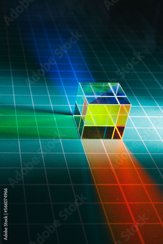 abstract dichroic cube prism with light spectrum dispersion photo